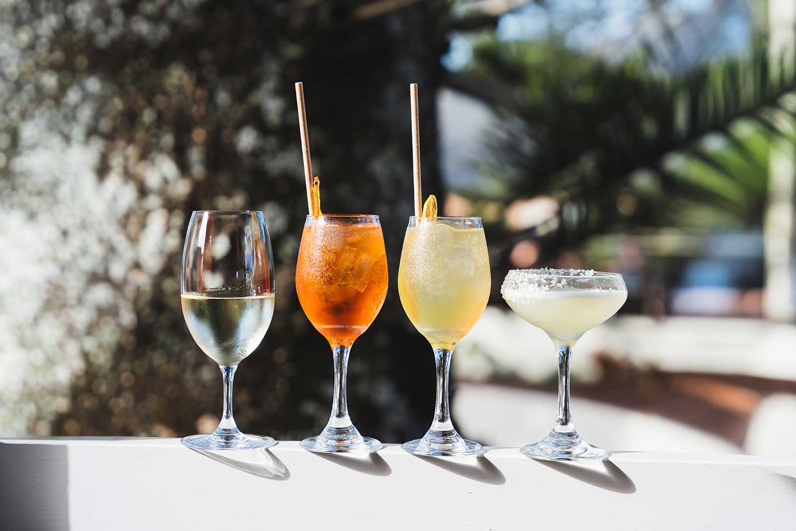 Loft Bar – Cocktail Selection Wine, spritzes and a margarita lined up beside the window at Loft Bar Byron Bay